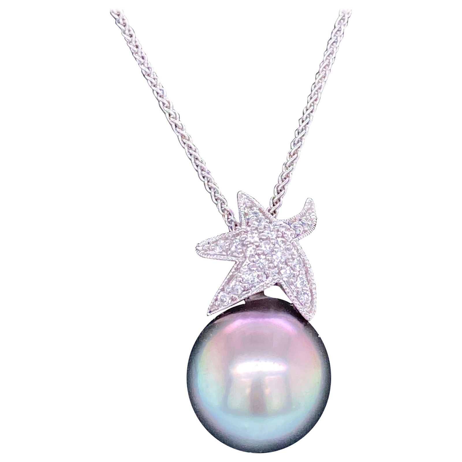 Harbor Diamonds 18K White Gold Tahitian Pearl Starfish Pendant Necklace: Harbor Diamonds 18K White Gold Tahitian Pearl Starfish Pendant Necklace This exquisite Tahitian Pearl Diamond Starfish Pendant Necklace is a stunning addition to any jewelry collection. Crafted from 1