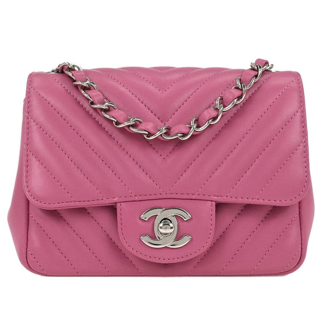 Chanel Pink Lambskin Chevron Mini Classic Flap Shoulder Bag: Chanel Pink Lambskin Chevron Mini Classic Flap Shoulder Bag This Chanel Mini Classic Square Flap Bag is a stylish accessory crafted from soft pink lambskin leather featuring a chic chevron pattern. De