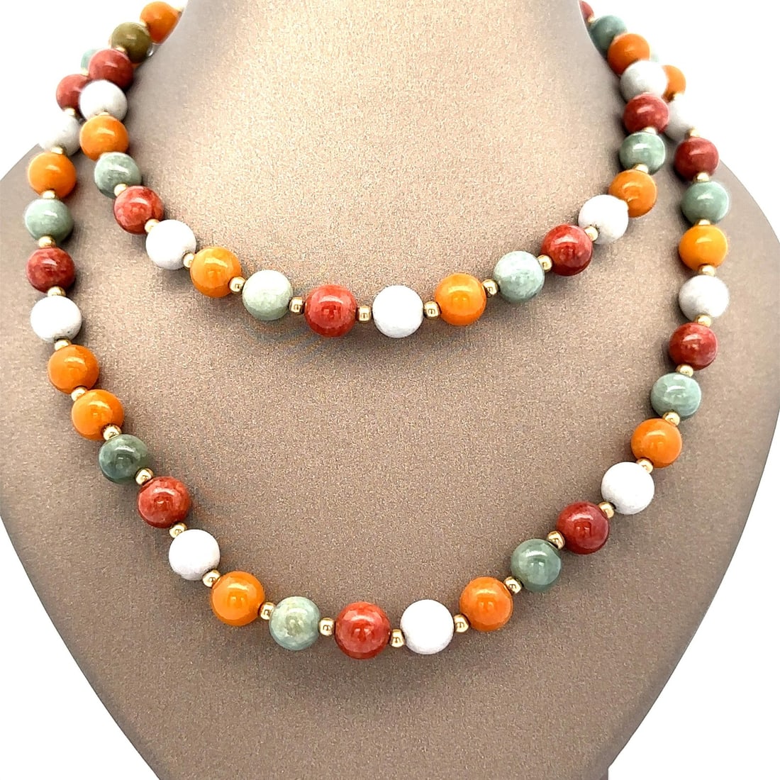 Vintage 14k Yellow Gold Multi Color Jade Bead Necklace 30" Long: Vintage 14k Yellow Gold Multi Color Jade Bead Necklace 30" Long This exquisite vintage slip-on necklace features a stunning array of natural jade beads, showcasing a harmonious blend of light green, m