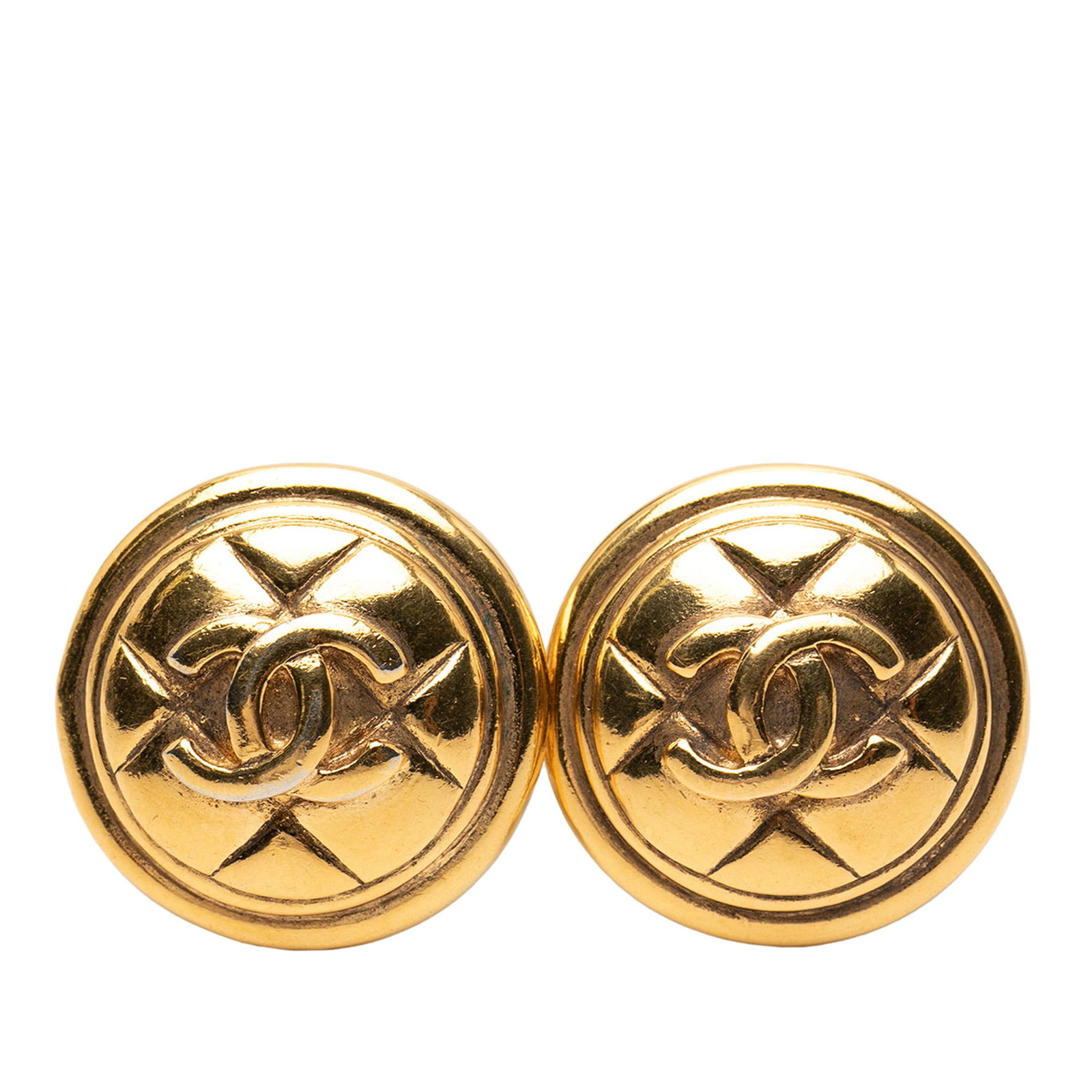 Chanel CC Logo Gold Plated Round Clip On Earrings: Chanel CC Logo Gold Plated Round Clip On Earrings These Chanel round clip-on earrings feature the iconic CC logo and are crafted from gold-plated metal. Designed in a classic round shape, they offer a