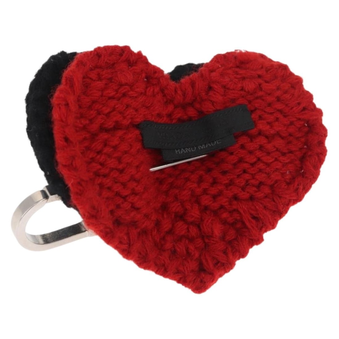 Red Leather Brooch by Prada with Heart and Safety Pin Design: Red Leather Brooch by Prada with Heart and Safety Pin Design This PRADA brooch features a distinctive heart design crafted from red leather. The accessory is complemented by a safety pin detail and co