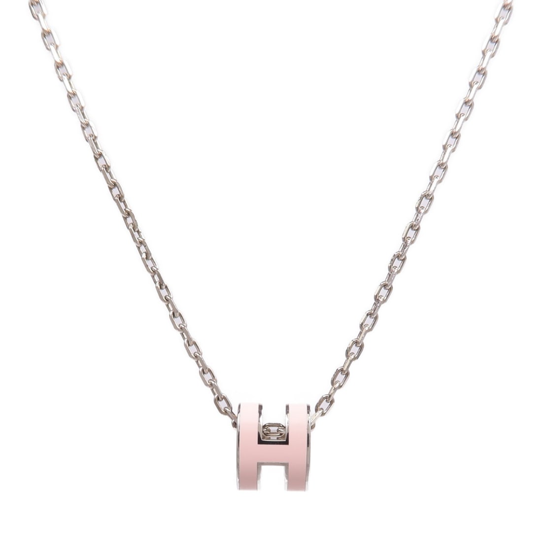 Hermes Mini Pop H Silver Tone Pink Pendant Necklace: Hermes Mini Pop H Silver Tone Pink Pendant Necklace This Hermes Mini Pop H necklace features a pink pendant set in silver-tone metal. The necklace is crafted in France and showcases a modern, minimali