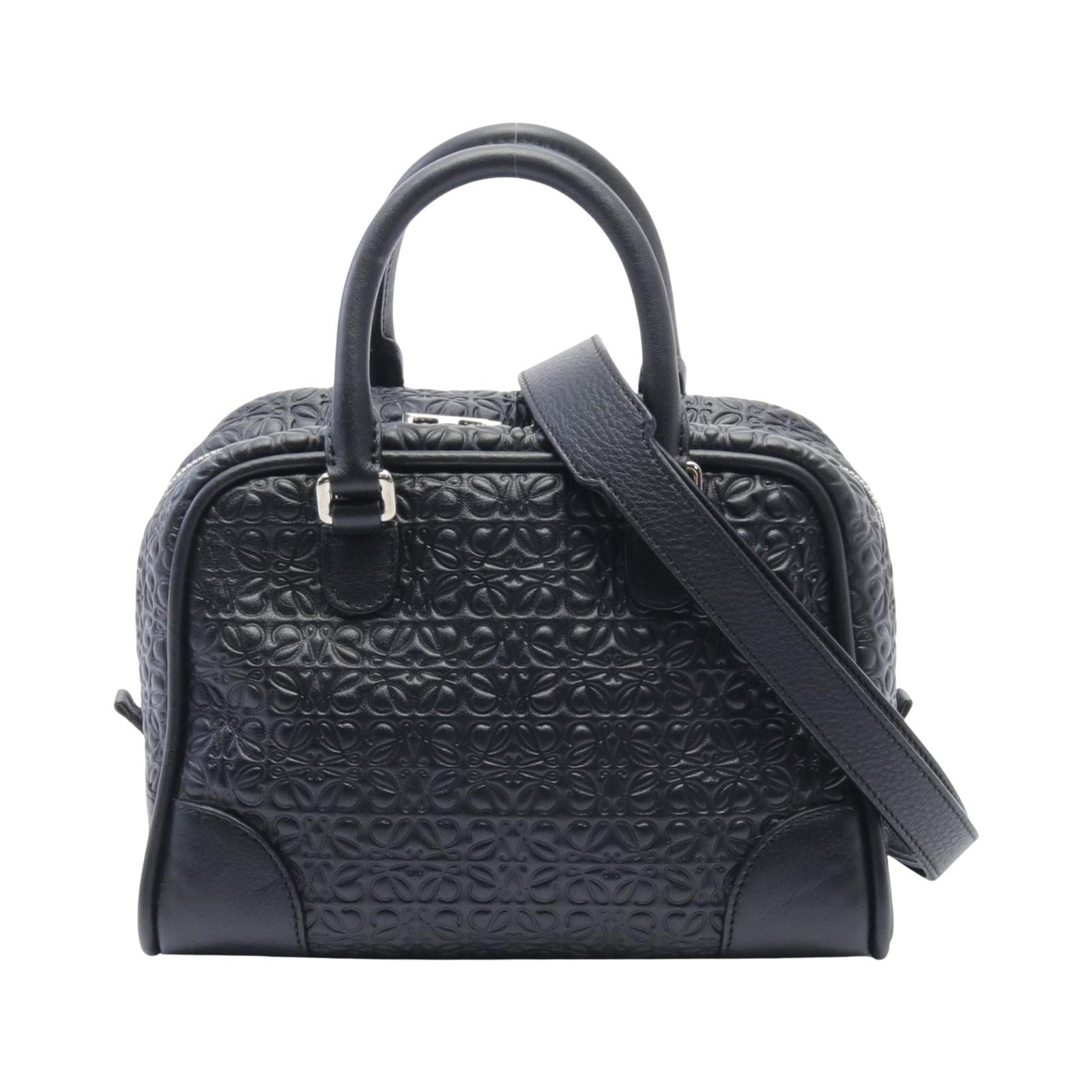 Black Leather Loewe Amazona 75 Handbag for Women: Black Leather Loewe Amazona 75 Handbag for Women The Loewe Amazona 75 handbag is crafted from black leather and features a timeless design with clean lines, offering a sophisticated and versatile acce