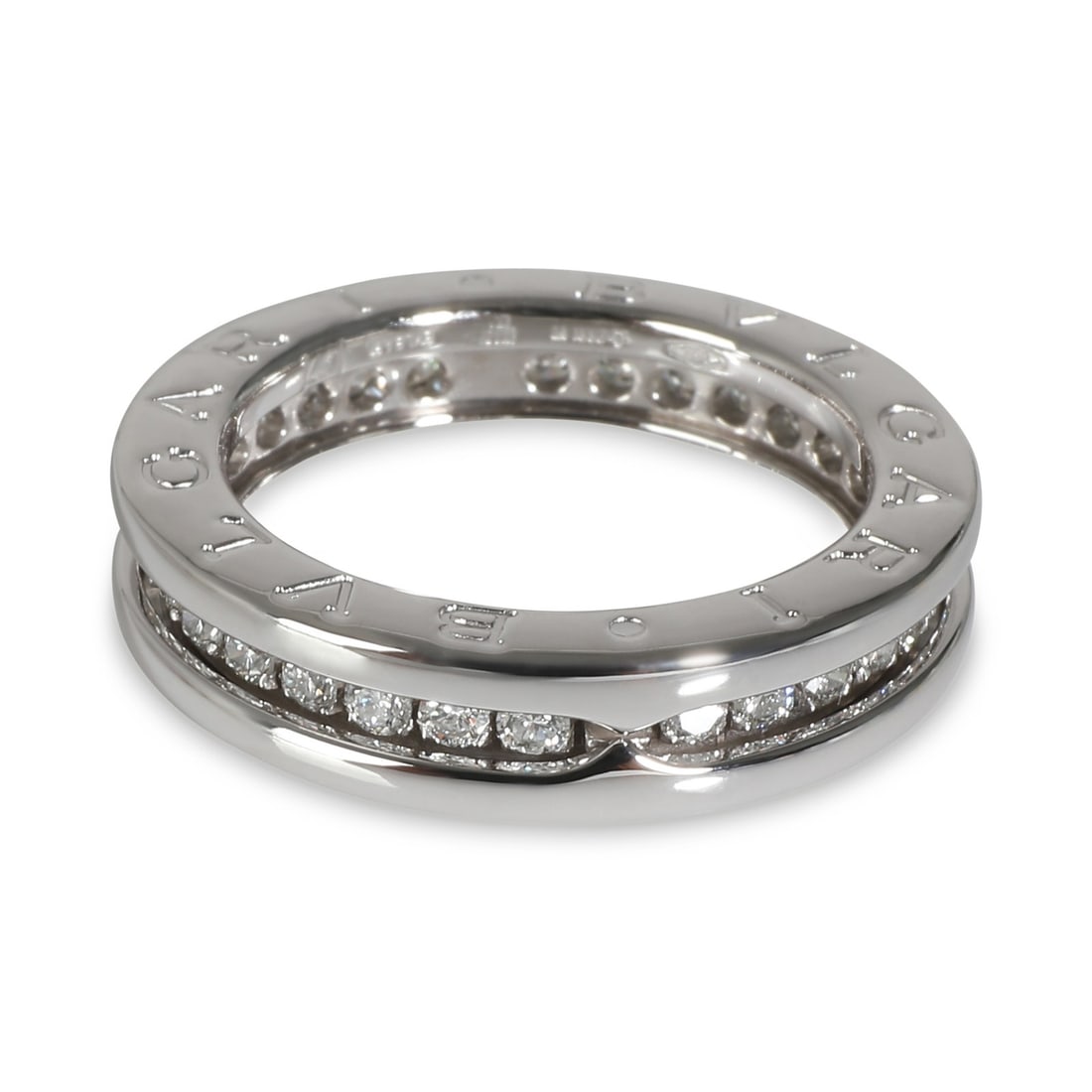 BVLGARI B.zero1 18k White Gold Fashion Ring with 0.45 CTW Diamond: BVLGARI B.zero1 18k White Gold Fashion Ring with 0.45 CTW Diamond This exquisite BVLGARI B.zero1 Ring is crafted in luxurious 18k white gold and features a stunning round brilliant diamond with a tota