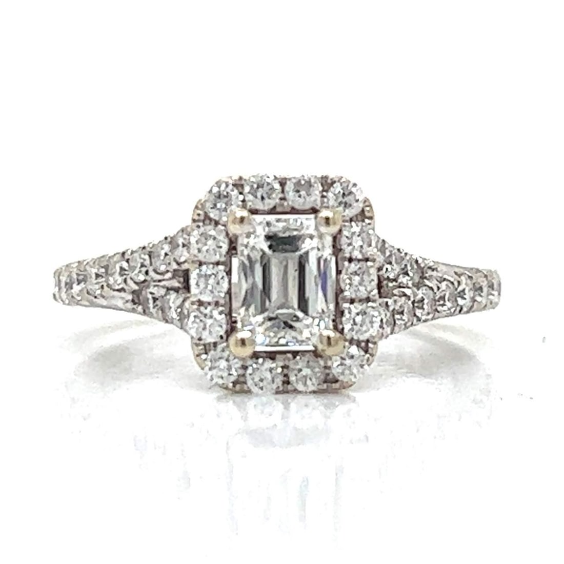14K White Gold 1.65 Ct. Diamond Ring with 38 Diamonds: 14K White Gold 1.65 Ct. Diamond Ring with 38 Diamonds This exquisite 14K white gold diamond ring features a stunning total weight of 1.65 carats. The central diamond, approximately 0.65 carats, showca