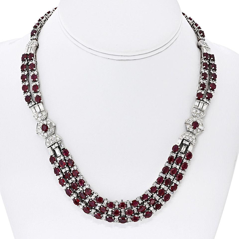 Art Deco Platinum Necklace with 40 Carats Rubies and 8.4 Carats Diamonds: Art Deco Platinum Necklace with 40 Carats Rubies and 8.4 Carats Diamonds This exquisite platinum necklace showcases a stunning Art Deco design, featuring approximately 40.00 carats of heated fine Burm