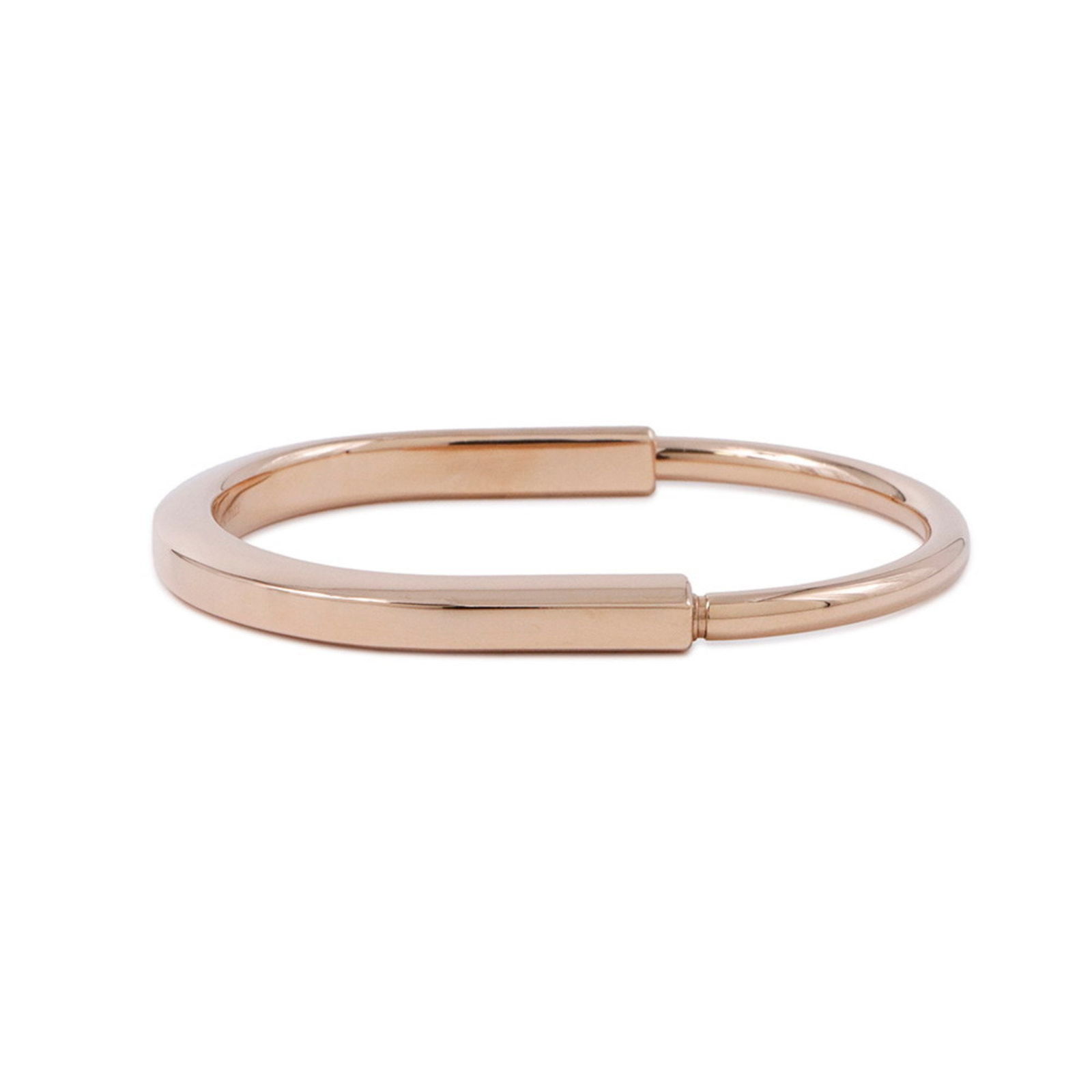 Tiffany Lock Rose Gold Bracelet 17cm Italian Made: Tiffany Lock Rose Gold Bracelet 17cm Italian Made This Tiffany & Co. Lock bracelet is crafted from rose gold and features a gold color. Designed for women, the bracelet measures 17 cm in length and ha