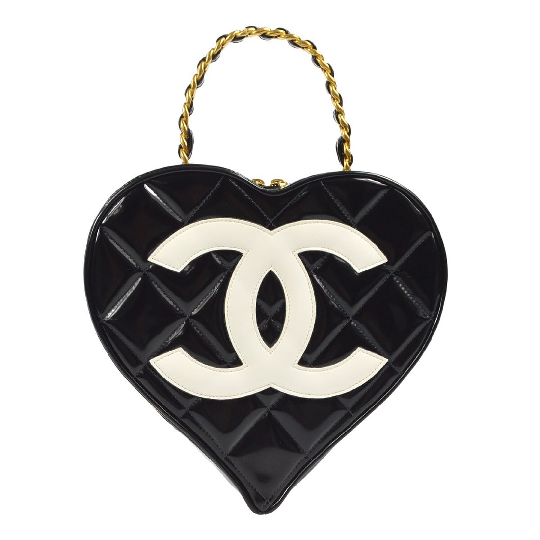 Chanel Black Patent Leather Quilted Heart Vanity Handbag: Chanel Black Patent Leather Quilted Heart Vanity Handbag This elegant Chanel Black Patent Leather Heart Vanity Handbag is a stunning addition to any collection. Featuring a chic matelasse pattern, thi