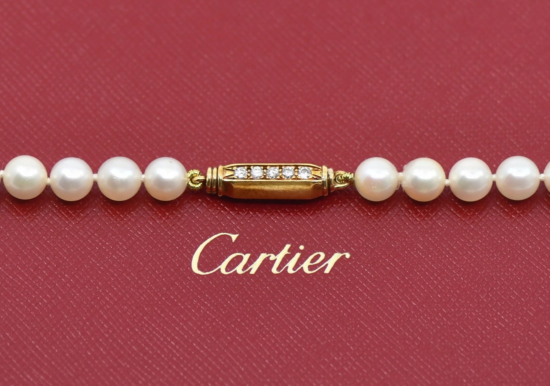 Cartier 18K Yellow Gold Pearl Diamond Necklace 28 Inch: Cartier 18K Yellow Gold Pearl Diamond Necklace 28 Inch This exquisite Cartier necklace features a stunning combination of 90 pearls and diamonds, elegantly crafted in 18K yellow gold. The necklace sho