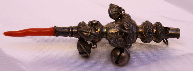 Victorian 1856 Sterling Silver Coral Baby Rattle by George Unite: Victorian 1856 Sterling Silver Coral Baby Rattle by George Unite This exquisite Victorian baby rattle, crafted from sterling silver and adorned with coral, was made by renowned silversmith George Unit
