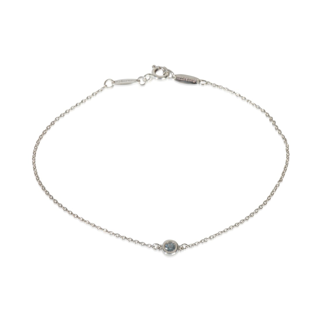 Elsa Peretti Color By The Yard Sterling Silver Bracelet with Aquamarine: Elsa Peretti Color By The Yard Sterling Silver Bracelet with Aquamarine This Tiffany & Co. Elsa Peretti Color By The Yard bracelet features a 0.06 carat aquamarine set in sterling silver. Designed wit