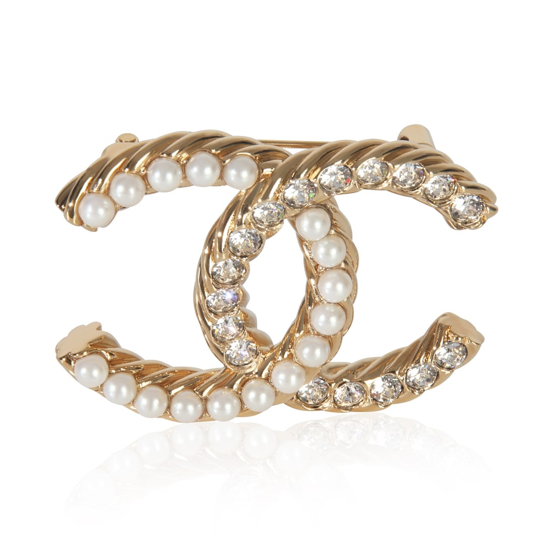 2023 Chanel Brooch Gold Plated with Strass and Faux Pearls: 2023 Chanel Brooch Gold Plated with Strass and Faux Pearls This Chanel brooch from the 2023 Strass & Faux Pearl Collection features a gold-plated finish and is designed without any main or side stones