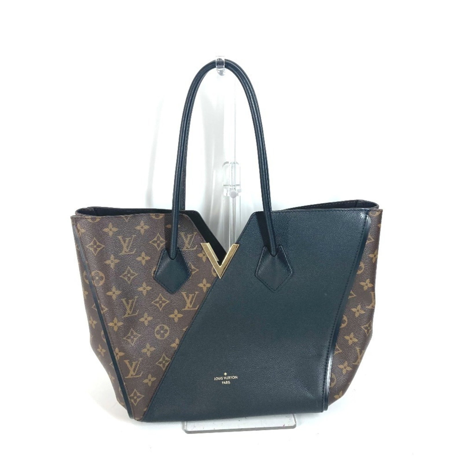Kimono Tote Bag from Louis Vuitton Brown Canvas France: Kimono Tote Bag from Louis Vuitton Brown Canvas France The Louis Vuitton Kimono is a women's handbag crafted from durable canvas in a brown color. Made in France, this bag features a spacious interior