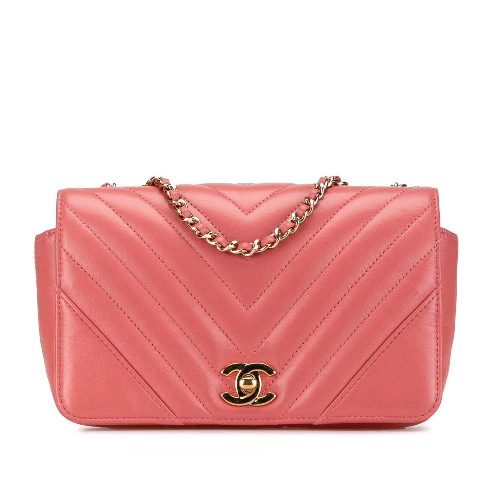Chanel Mini Chevron Pink Leather Flap Crossbody Bag: Chanel Mini Chevron Pink Leather Flap Crossbody Bag This stylish Chanel Mini Chevron Calfskin Statement Flap crossbody bag embodies elegance with its quilted calfskin leather body and chic pink hue. I