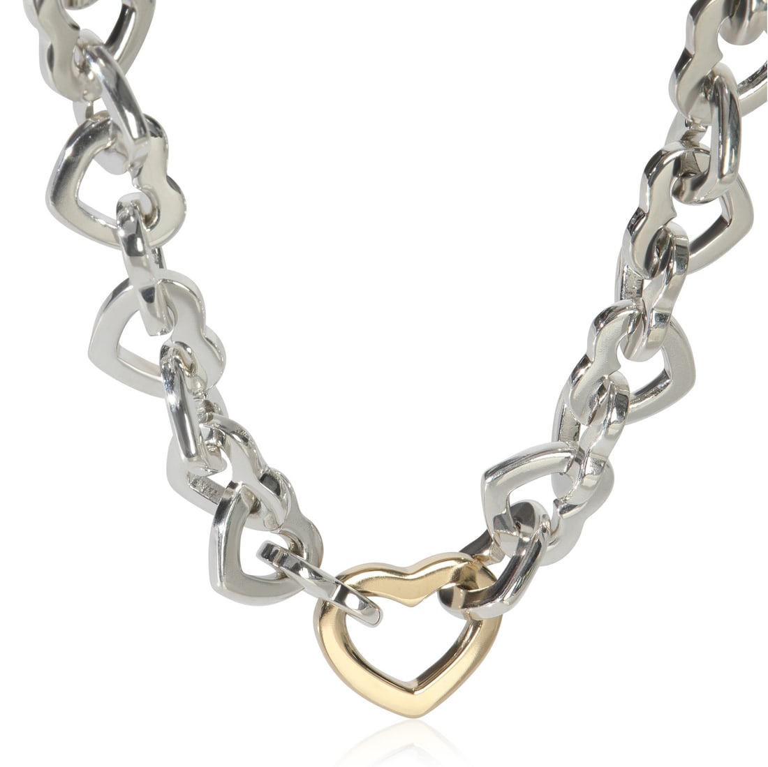 Heart Link Necklace in 18k Yellow Gold and Sterling Silver by Tiffany & Co.: Heart Link Necklace in 18k Yellow Gold and Sterling Silver by Tiffany & Co. This Tiffany & Co. Heart Link necklace is crafted from 18k yellow gold and sterling silver. It features a heart link design