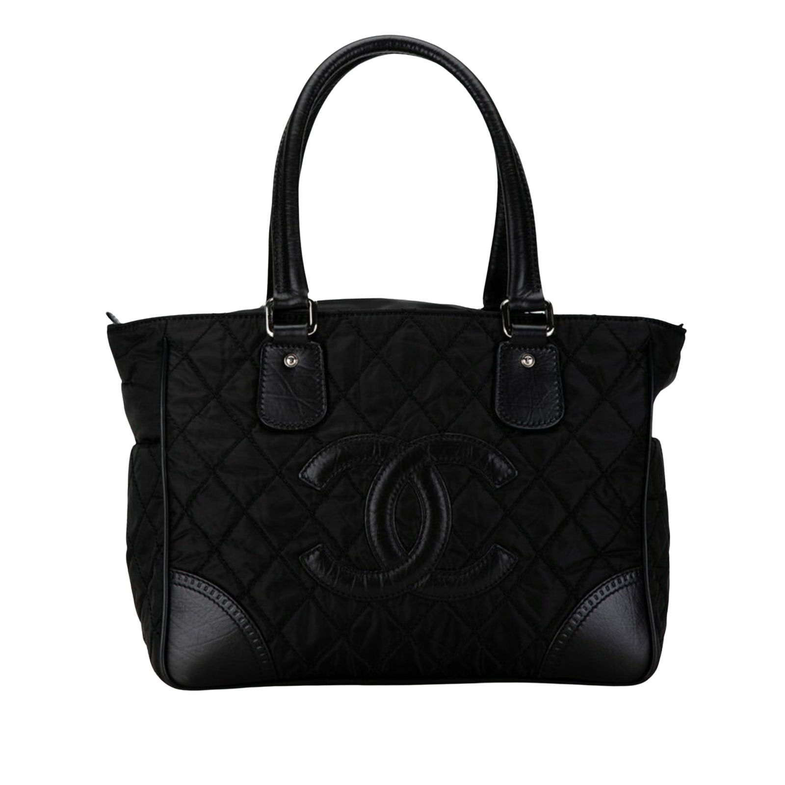 Black Synthetic Tote Bag Chanel Logo CC Model 25cm x 32.5cm: Black Synthetic Tote Bag Chanel Logo CC Model 25cm x 32.5cm This Chanel Logo CC handbag is a stylish and functional tote designed for women. Crafted from durable synthetic material in classic black, i
