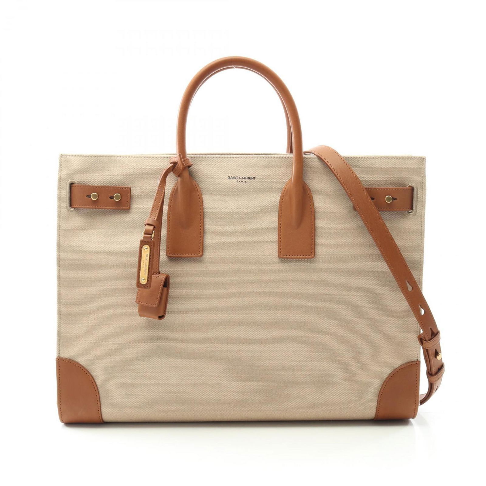 Beige Canvas Saint Laurent Sac de Jour Large Tote Bag: Beige Canvas Saint Laurent Sac de Jour Large Tote Bag The Saint Laurent Sac de Jour Large is a beige canvas handbag designed for women. Made in Italy, this bag features a spacious interior and elegant