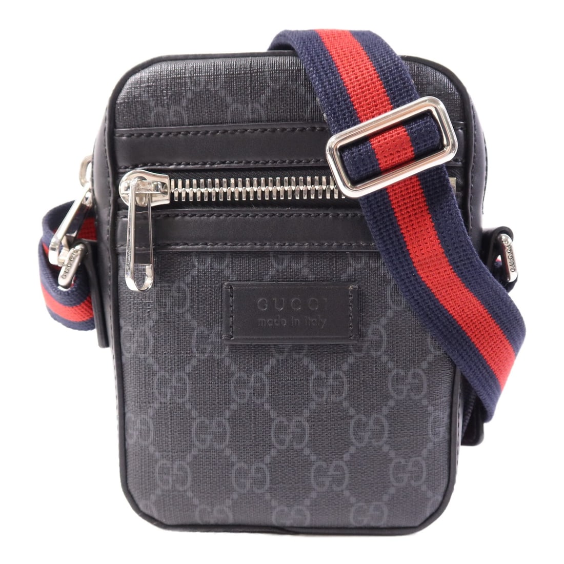 Black GG Supreme Coated Canvas Messenger by Gucci with Silver Hardware: Black GG Supreme Coated Canvas Messenger by Gucci with Silver Hardware This Gucci GG Supreme messenger shoulder bag is crafted from black PVC coated canvas and features silver-tone hardware. Made in I