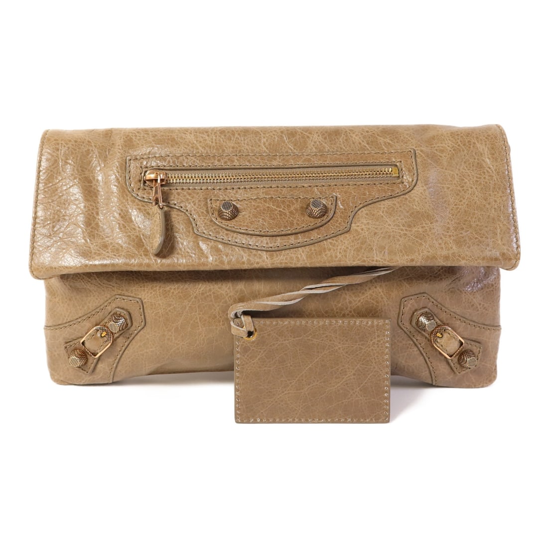 BALENCIAGA Taupe Lambskin Leather Clutch 282011 GHW Made in France: BALENCIAGA Taupe Lambskin Leather Clutch 282011 GHW Made in France This BALENCIAGA clutch showcases a refined design crafted from luxurious lambskin leather in a taupe hue. The bag measures 7.1 inches