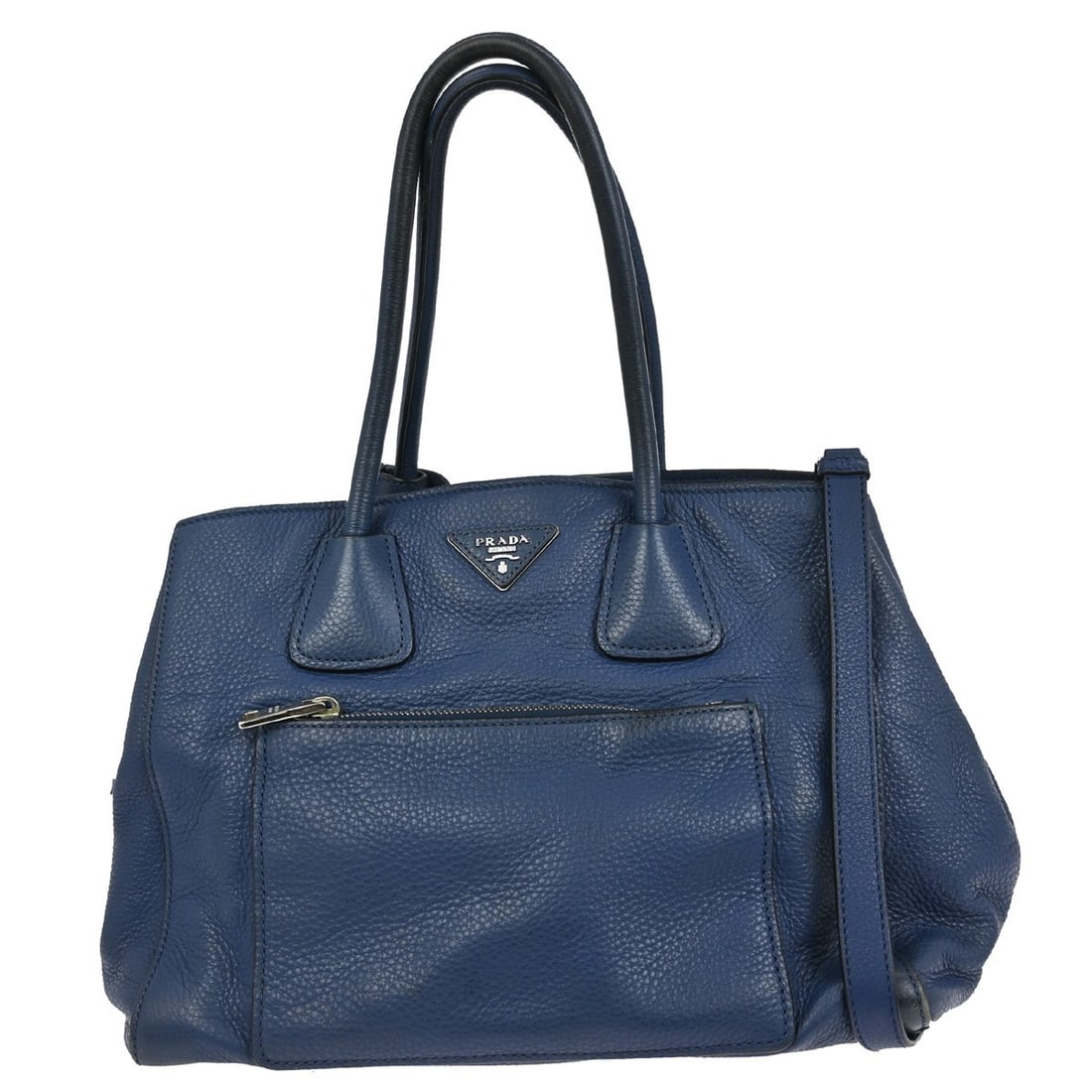Prada Blue Leather Top Handle 2way Medium Handbag with Logo Accent: Prada Blue Leather Top Handle 2way Medium Handbag with Logo Accent This Prada 2-way handbag is a stylish addition to your casual wardrobe. Featuring a rich blue leather exterior and a spacious interio
