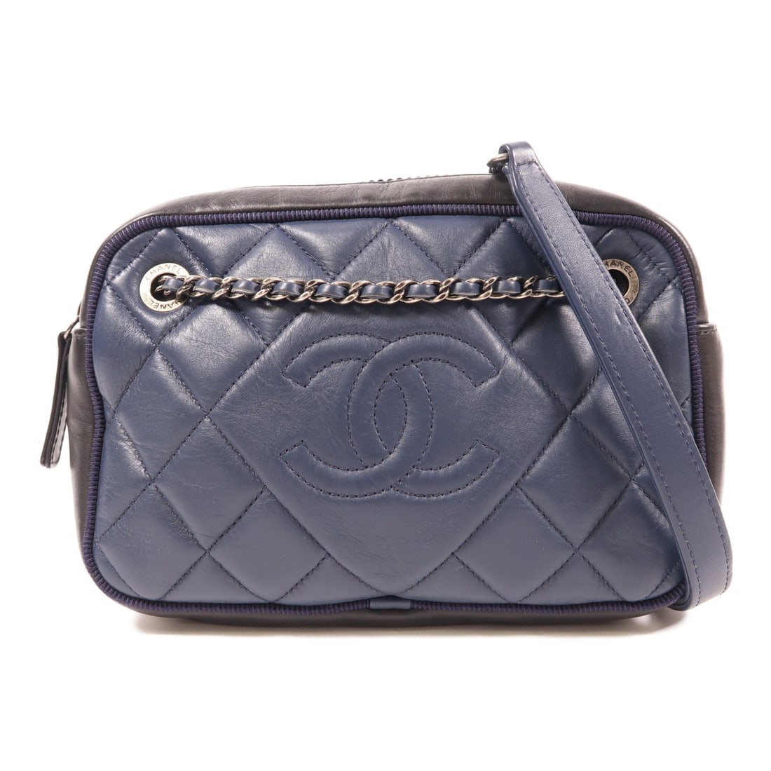 CHANEL Navy Calfskin Leather Shoulder Bag with Silver Chain: CHANEL Navy Calfskin Leather Shoulder Bag with Silver Chain This elegant CHANEL shoulder bag is crafted from luxurious calfskin leather in a striking navy color. Designed with a chic chain strap, it o