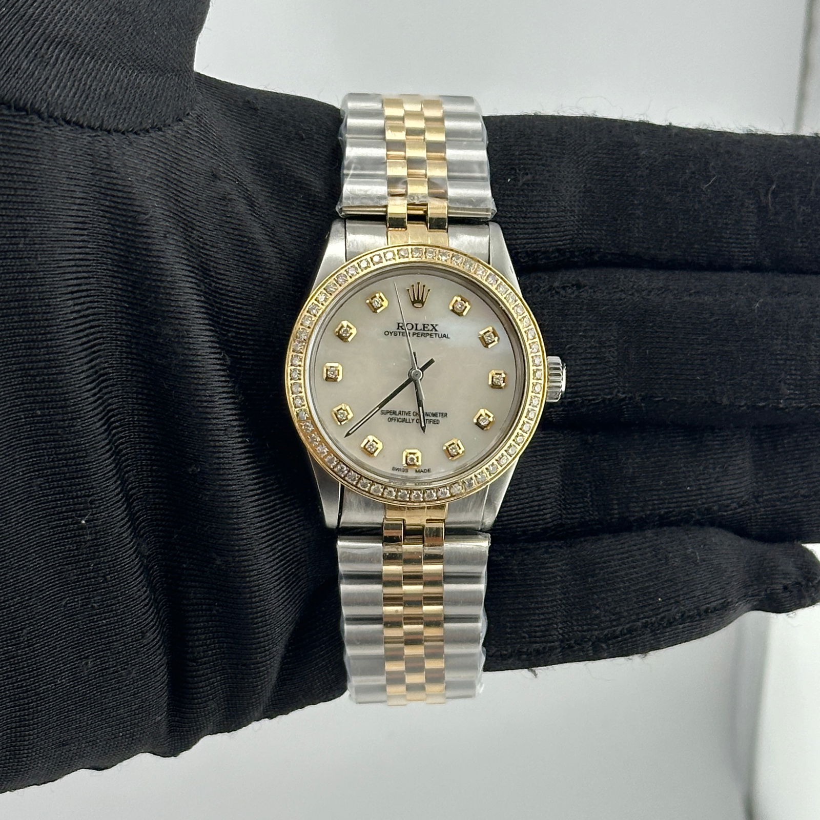 AM Jubilee Yellow Gold Plated Oyster Perpetual Ref 6426 White MOP Diamond Dial: AM Jubilee Yellow Gold Plated Oyster Perpetual Ref 6426 White MOP Diamond Dial This Rolex Oyster Perpetual watch features an aftermarket white mother-of-pearl dial adorned with diamond markers and a p