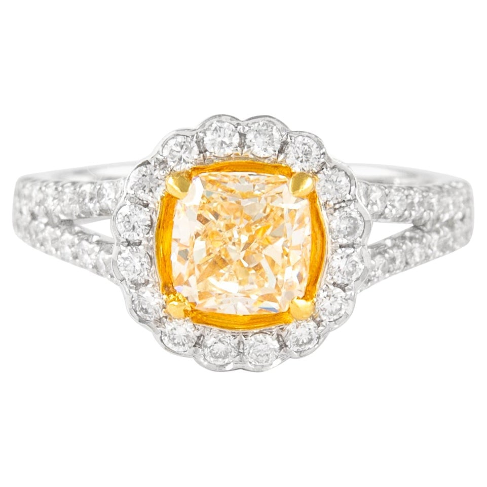 1.93ct Fancy Light Yellow VVS2 Diamond Ring 18k Gold Halo: 1.93ct Fancy Light Yellow VVS2 Diamond Ring 18k Gold Halo This exquisite 1.93ctt Fancy Light Yellow Cushion VVS2 Diamond Ring is a stunning example of contemporary jewelry design. Crafted in a luxurio