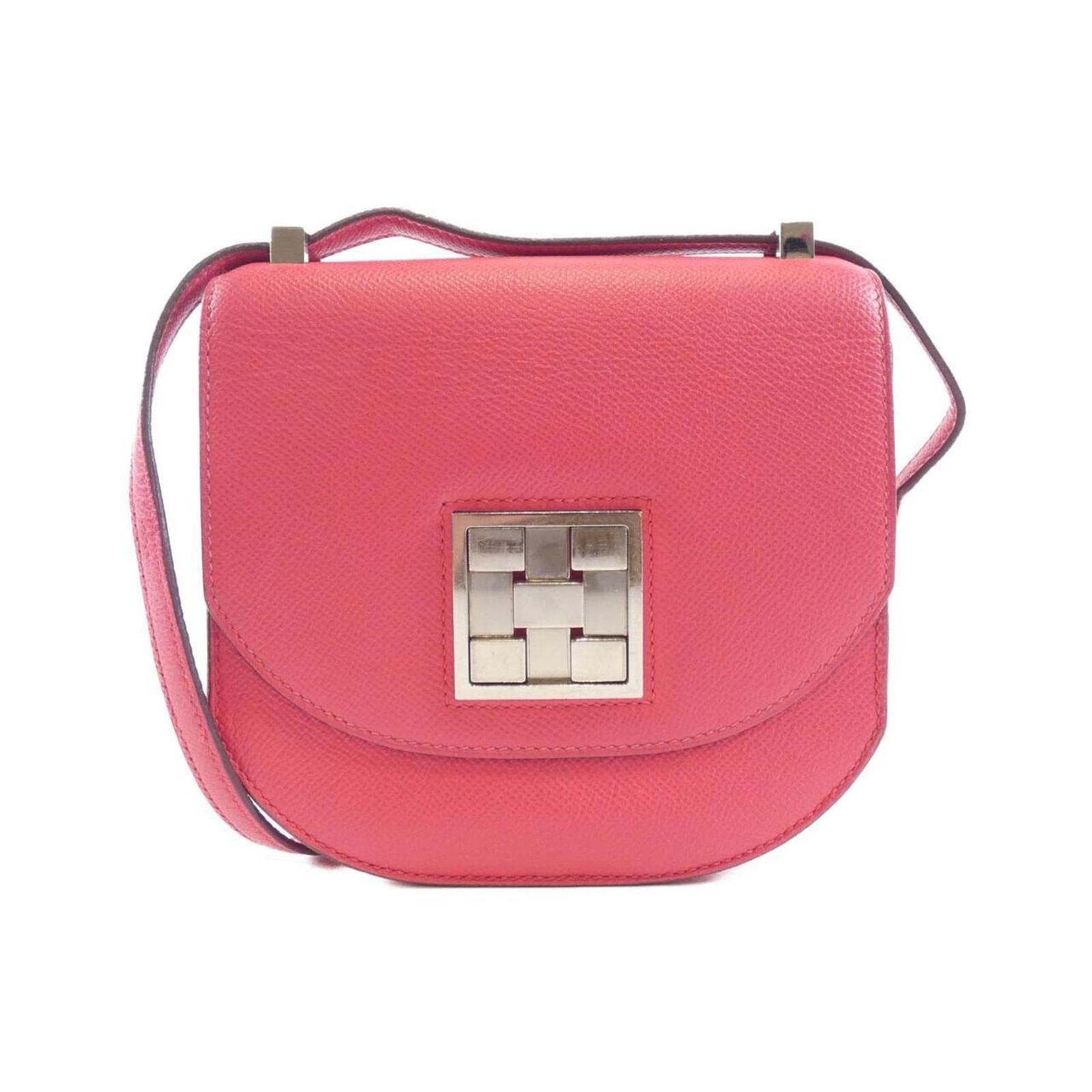Pink Leather Mosaique Shoulder Bag by Hermes 16cm: Pink Leather Mosaique Shoulder Bag by Hermes 16cm This Hermes Mosaique handbag features a stylish pink leather exterior and a compact design, crafted in France. The bag shows some small stains on both