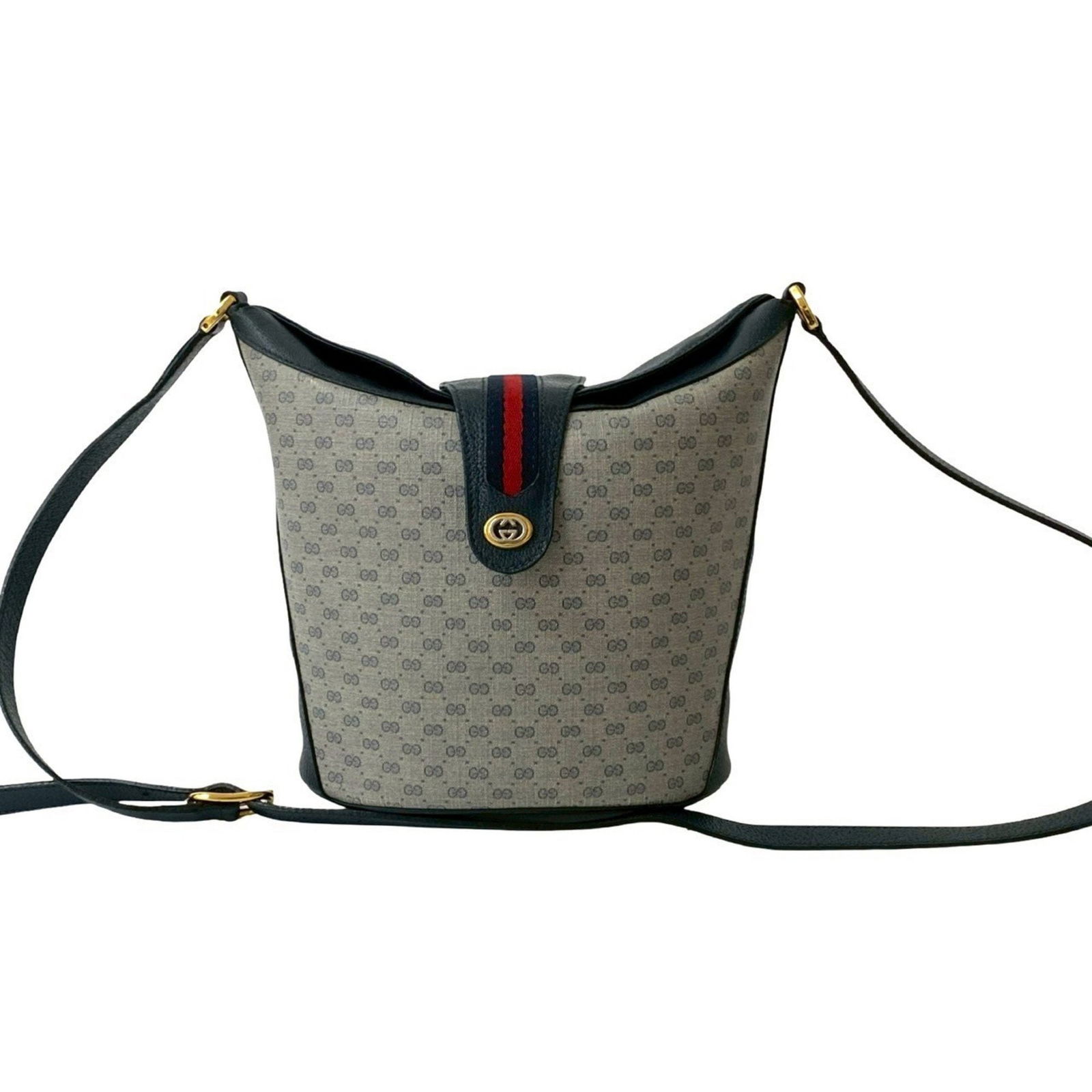 Navy Gucci Sherry PVC Handbag Medium 17cm x 19cm x 11cm: Navy Gucci Sherry PVC Handbag Medium 17cm x 19cm x 11cm This Gucci Sherry bag features a navy PVC exterior with a structured silhouette. It is designed for women and showcases Italian craftsmanship. T