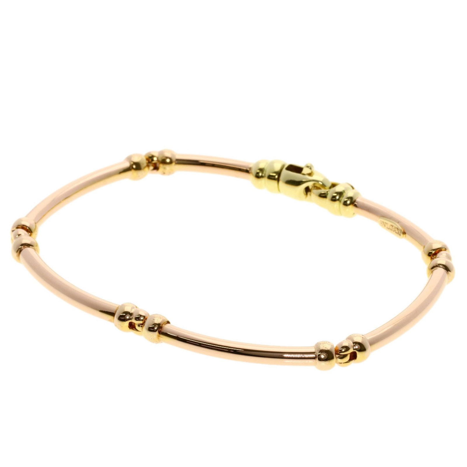 18K Pink and Yellow Gold Italian Bracelet by Bulgari 17cm: 18K Pink and Yellow Gold Italian Bracelet by Bulgari 17cm This Bulgari bracelet is crafted from 18K pink and yellow gold, featuring a length of 17cm. Designed for women, it showcases a gold color and