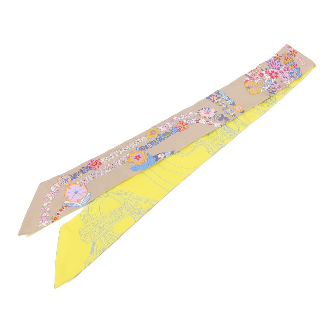 HERMES Twilly Silk Scarf in Grey and Yellow: HERMES Twilly Silk Scarf in Grey and Yellow Elevate your style with this exquisite HERMES Twilly Scarf, crafted from luxurious silk. This scarf features a sophisticated gray and yellow color palette,