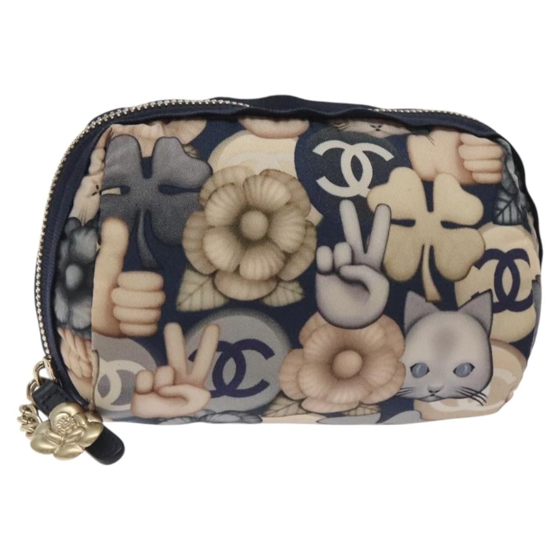 Navy Nylon Chanel Coco Mark Pouch with CC Logo: Navy Nylon Chanel Coco Mark Pouch with CC Logo This CHANEL pouch is crafted from navy nylon and features the iconic COCO mark. The pouch is made in Italy and has a compact design, making it suitable f
