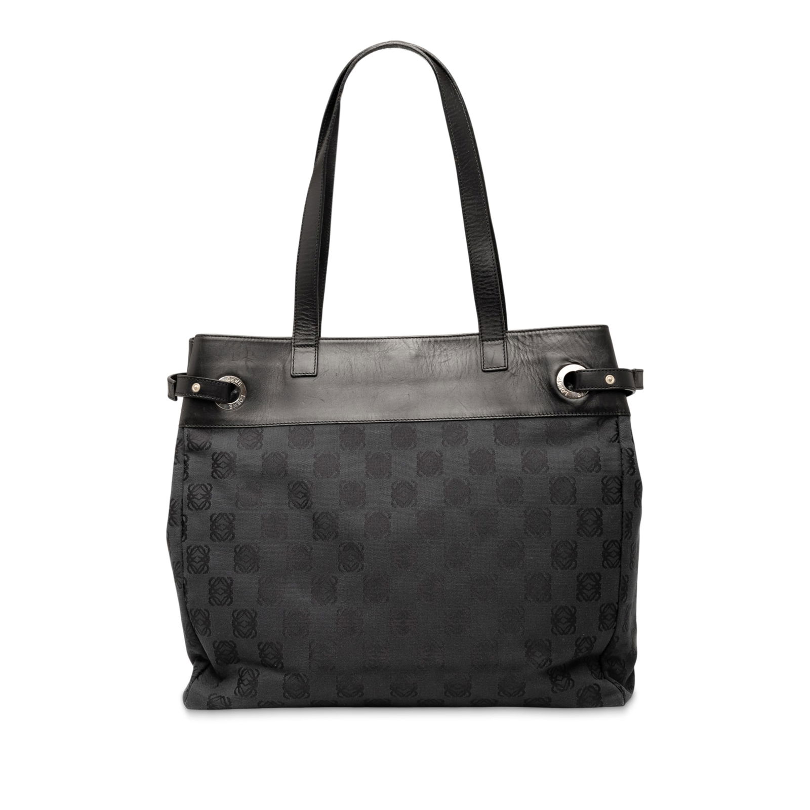 LOEWE Anagram Canvas Tote Black Leather Trim Spain: LOEWE Anagram Canvas Tote Black Leather Trim Spain The LOEWE Anagram Canvas Tote is a stylish and functional accessory that features a durable canvas body complemented by leather trim. It includes fla