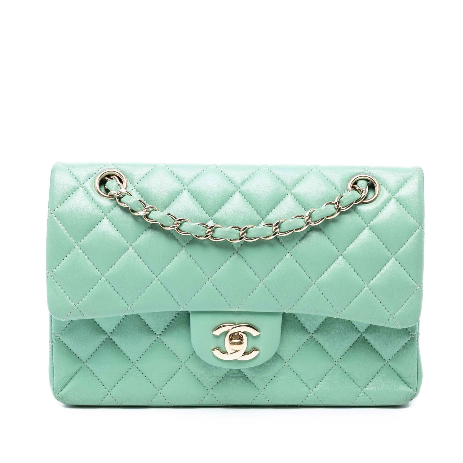 Chanel Small Classic Green Lambskin Double Flap Bag: Chanel Small Classic Green Lambskin Double Flap Bag Introducing the Chanel Small Classic Lambskin Double Flap shoulder bag, a timeless piece crafted from luxurious quilted lambskin. This elegant bag f