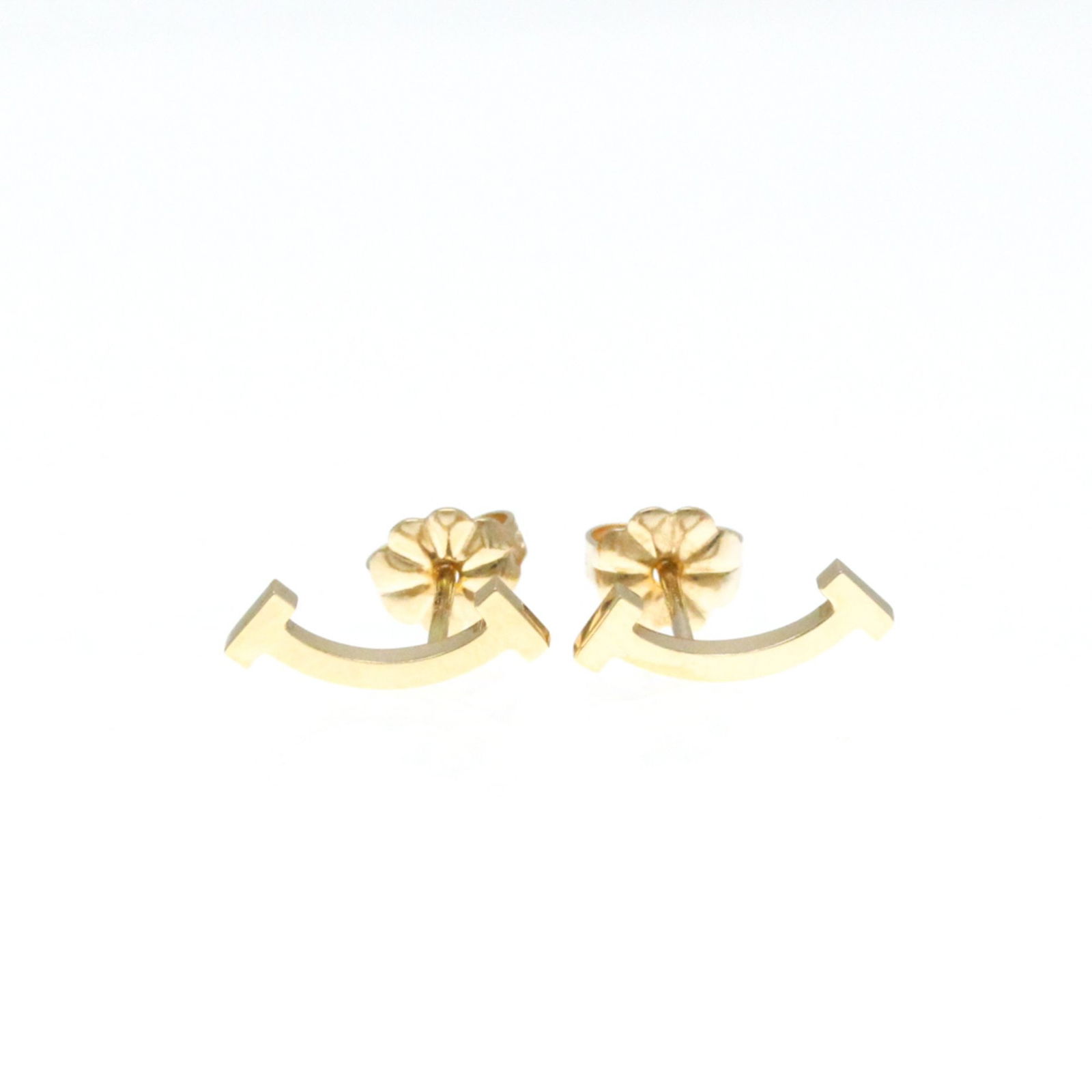 Rose Gold T Smile Necklace by Tiffany and Co: Rose Gold T Smile Necklace by Tiffany and Co This Tiffany & Co. T Smile necklace features a delicate design crafted from rose gold. The piece measures 3.60mm by 13.30mm and is designed for women. Made