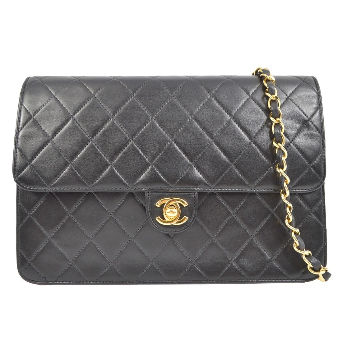 Chanel Classic Black Lambskin Medium Half Flap Shoulder Bag: Chanel Classic Black Lambskin Medium Half Flap Shoulder Bag The Chanel Black Lambskin Turnlock Medium Half Flap Shoulder Bag is a timeless accessory that blends elegance and functionality. This medium