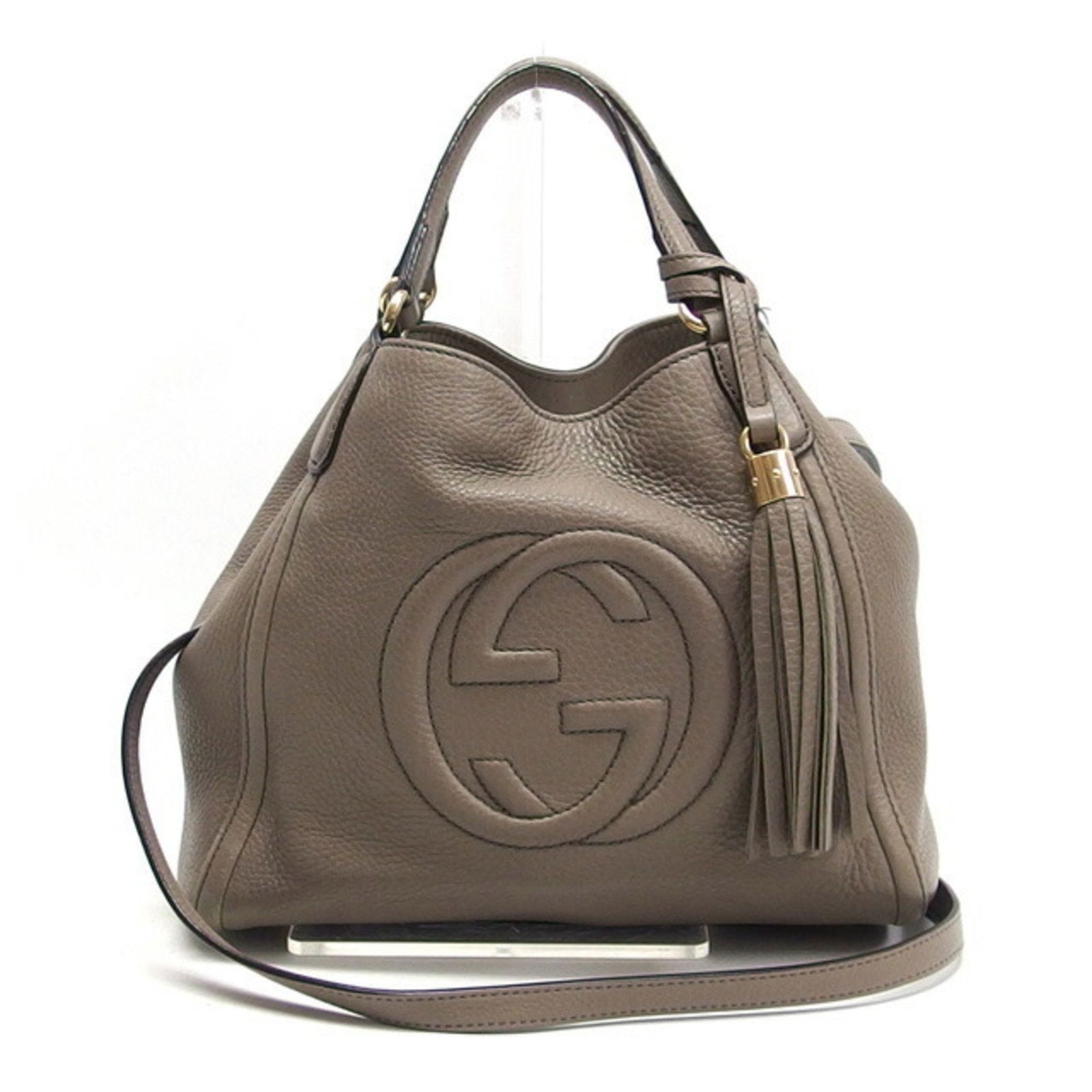 Brown Leather Gucci Soho Tote Shoulder Bag for Women: Brown Leather Gucci Soho Tote Shoulder Bag for Women The Gucci Soho tote and shoulder bag is a refined accessory designed for women, crafted from rich brown leather. This versatile bag combines functi