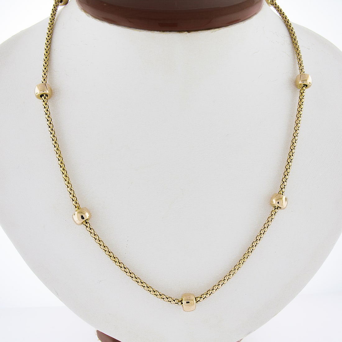 UNOAERRE 14K Yellow Gold 18 Popcorn Link Rondell Station Necklace: UNOAERRE 14K Yellow Gold 18 Popcorn Link Rondell Station Necklace This stunning necklace features a beautiful 18-inch popcorn link chain accented with polished rondell stations, crafted from solid 14K