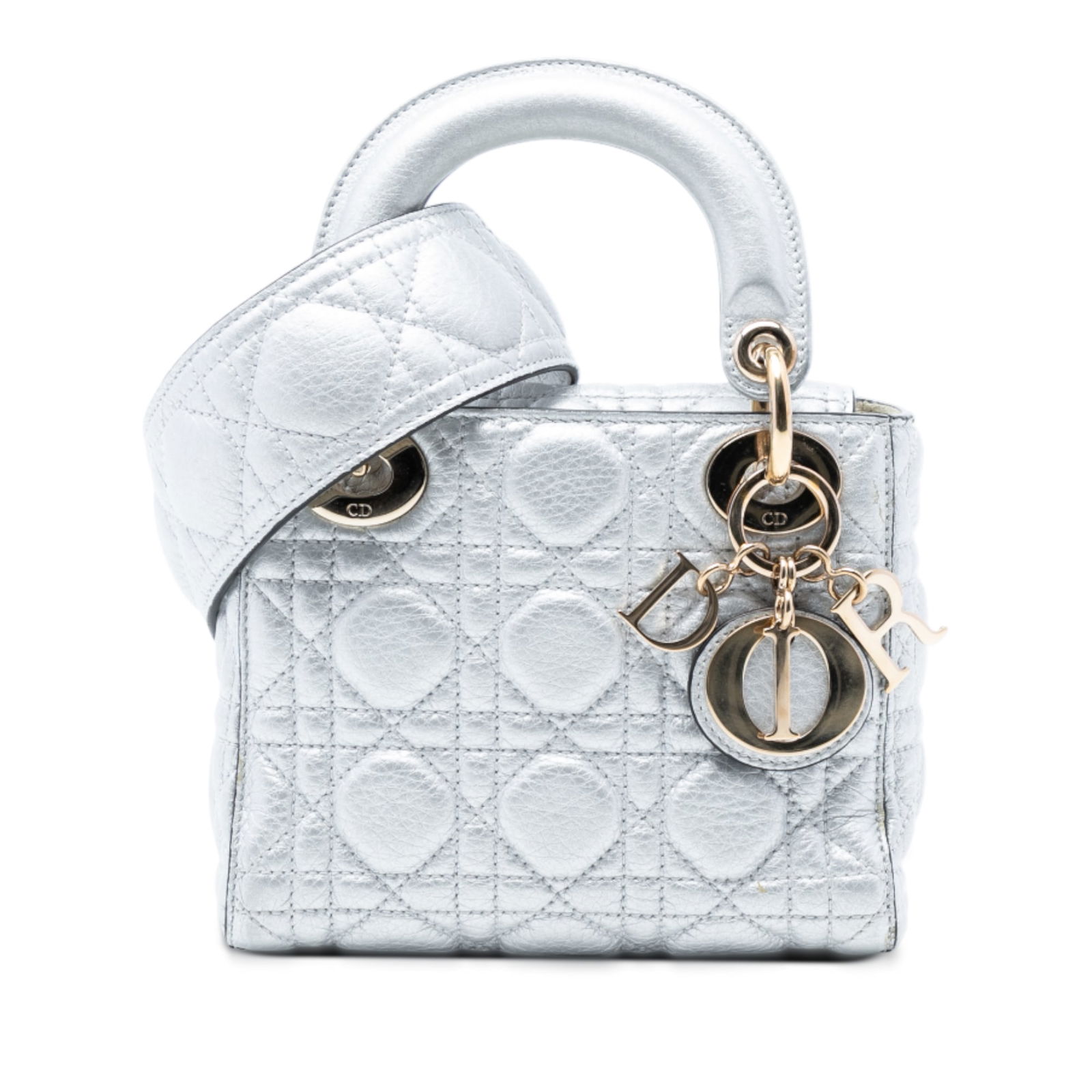 Dior Mini Lady Dior Silver Quilted Metallic Lambskin Bag with Strap: Dior Mini Lady Dior Silver Quilted Metallic Lambskin Bag with Strap This Mini Lady Dior handbag features a quilted metallic lambskin leather body in silver, complemented by flat leather top handles an