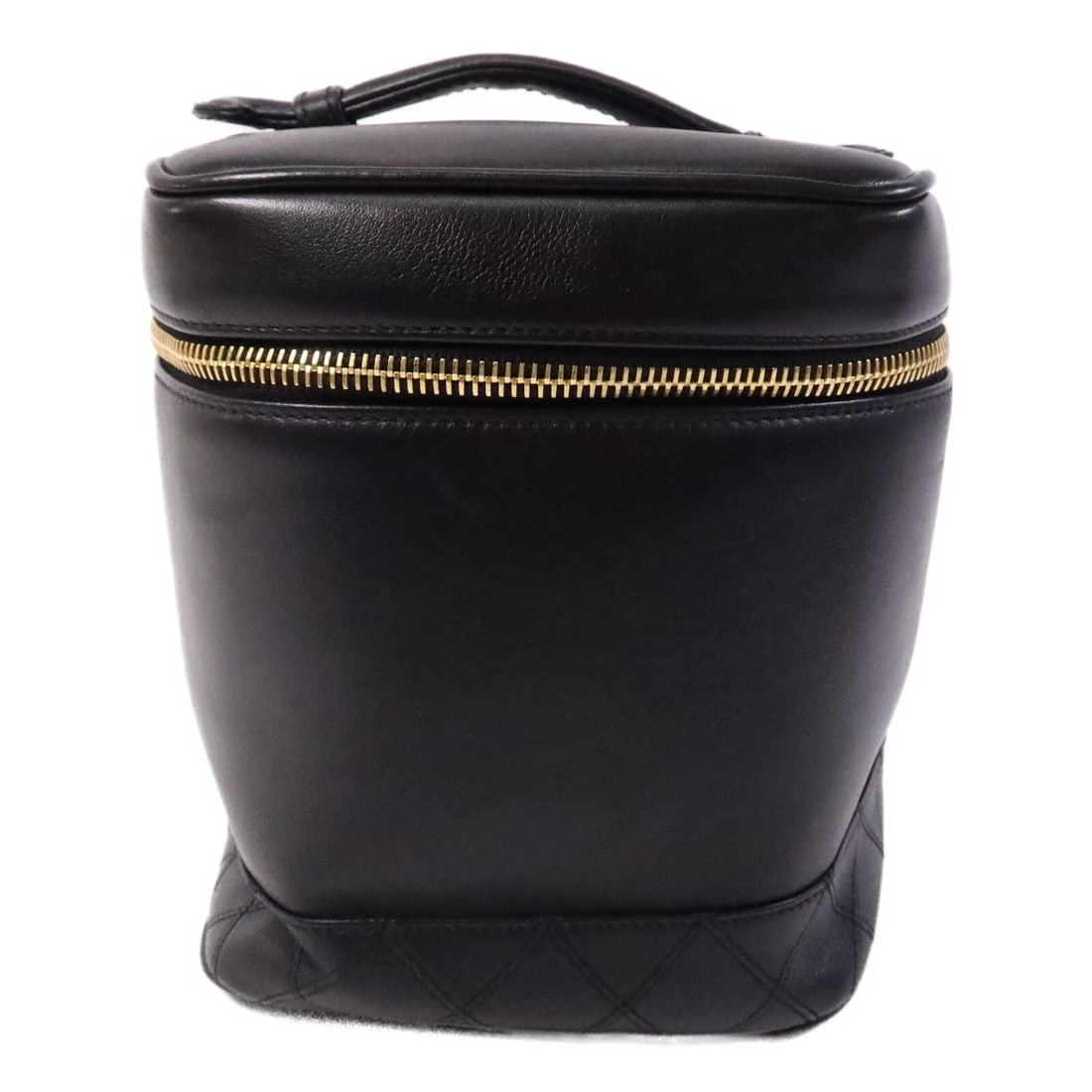 Chanel Vintage Black Lambskin Vanity Handbag with CC Gold Hardware: Chanel Vintage Black Lambskin Vanity Handbag with CC Gold Hardware This CHANEL vintage vanity case hand bag features luxurious black lambskin leather and classic CC detailing. It is designed in a regu
