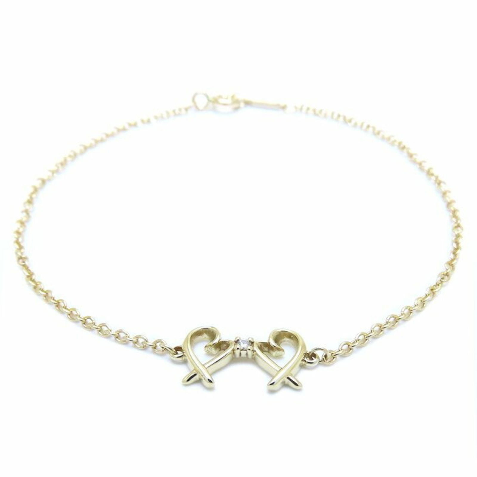 Yellow Gold Double Loving Heart Bracelet by Tiffany & Co 17.5 cm: Yellow Gold Double Loving Heart Bracelet by Tiffany & Co 17.5 cm This Tiffany & Co. Double Loving Heart bracelet features a yellow gold design with a length of 17.5 cm. Crafted for women, it is made i