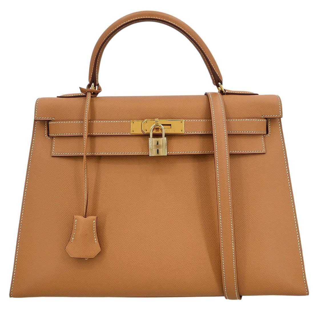 Hermes Kelly 32 Natural Courchevel Leather 2-Way Handbag: Hermes Kelly 32 Natural Courchevel Leather 2-Way Handbag Introducing the exquisite Hermes Natural Courchevel Kelly 32 Sellier 2-way Handbag, a perfect blend of luxury and functionality. This medium-si