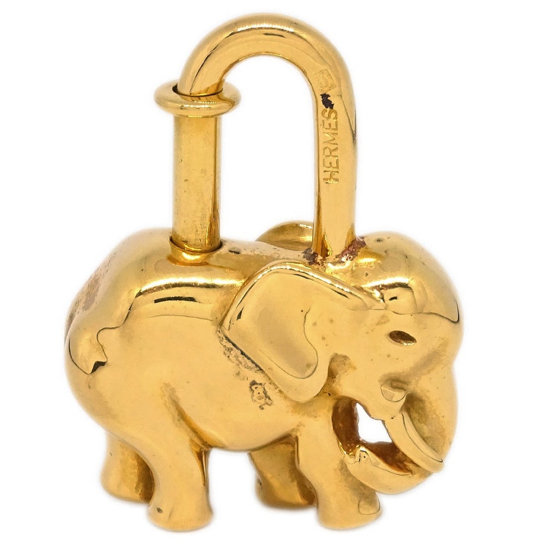 Hermes 1988 Gold Elephant Charm Vintage Good Luck: Hermes 1988 Gold Elephant Charm Vintage Good Luck This exquisite vintage charm from Hermes, crafted in 1988, showcases a delightful elephant design, symbolizing good luck and wisdom. The charm is made