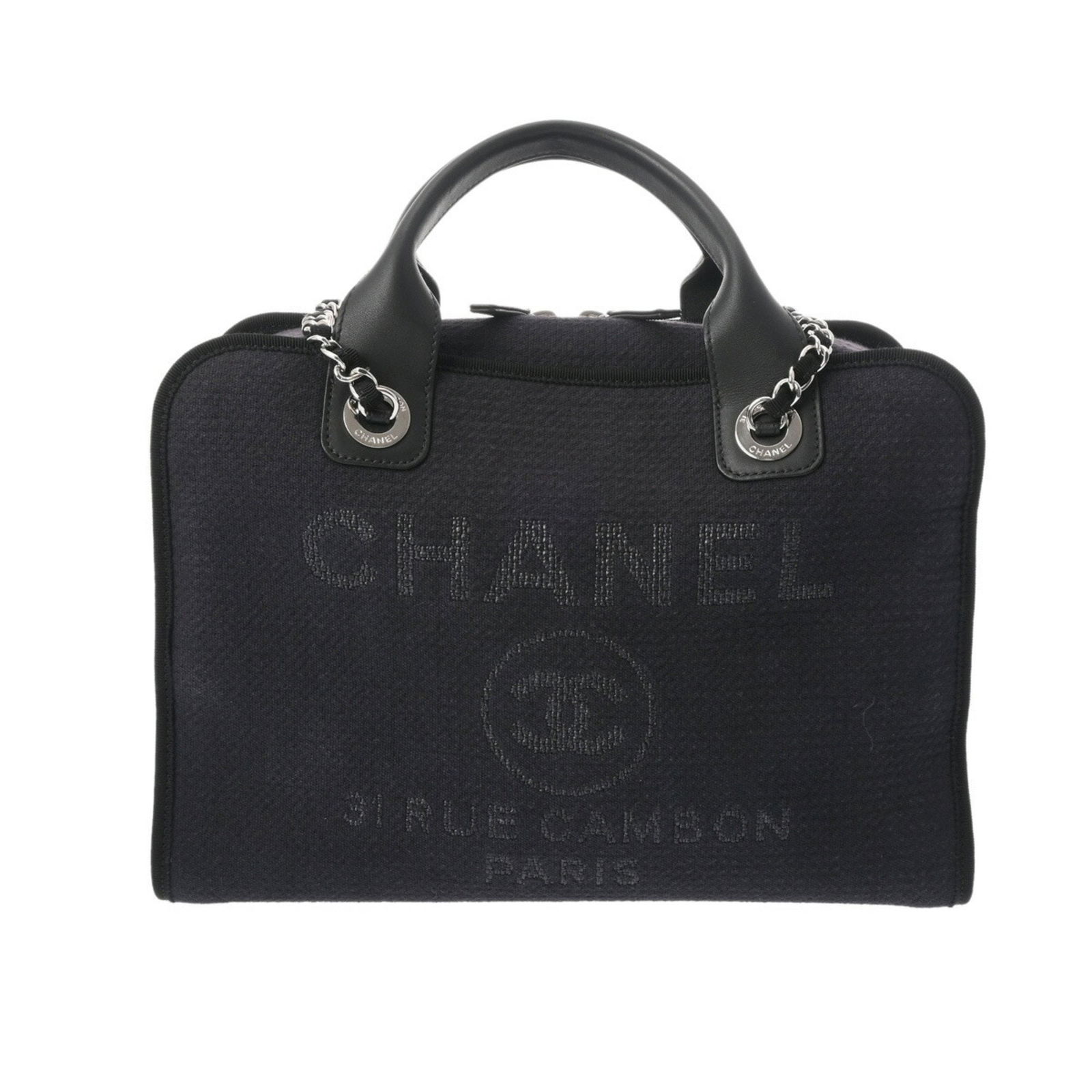 Navy Canvas Deauville Handbag by Chanel with Silver Hardware: Navy Canvas Deauville Handbag by Chanel with Silver Hardware This Chanel Deauville handbag is crafted from navy canvas with leather accents and silver hardware. Designed for women, it features a secur