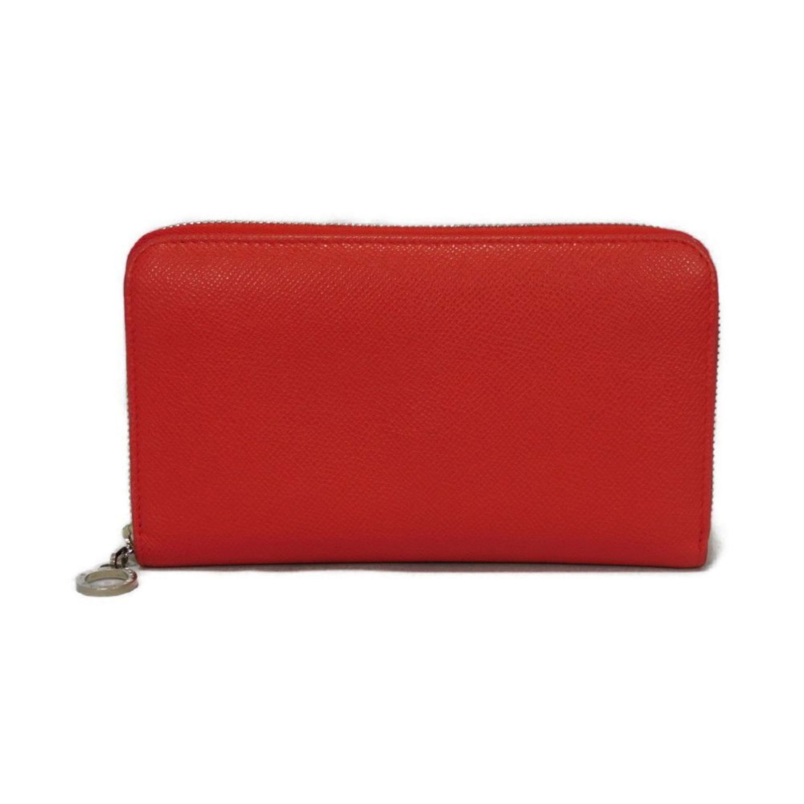 Red Leather Bulgari Zip Style Wallet from Italy: Red Leather Bulgari Zip Style Wallet from Italy This Bulgari zip wallet features a striking red leather exterior, crafted in Italy. The wallet is designed for universal use and offers a spacious inter