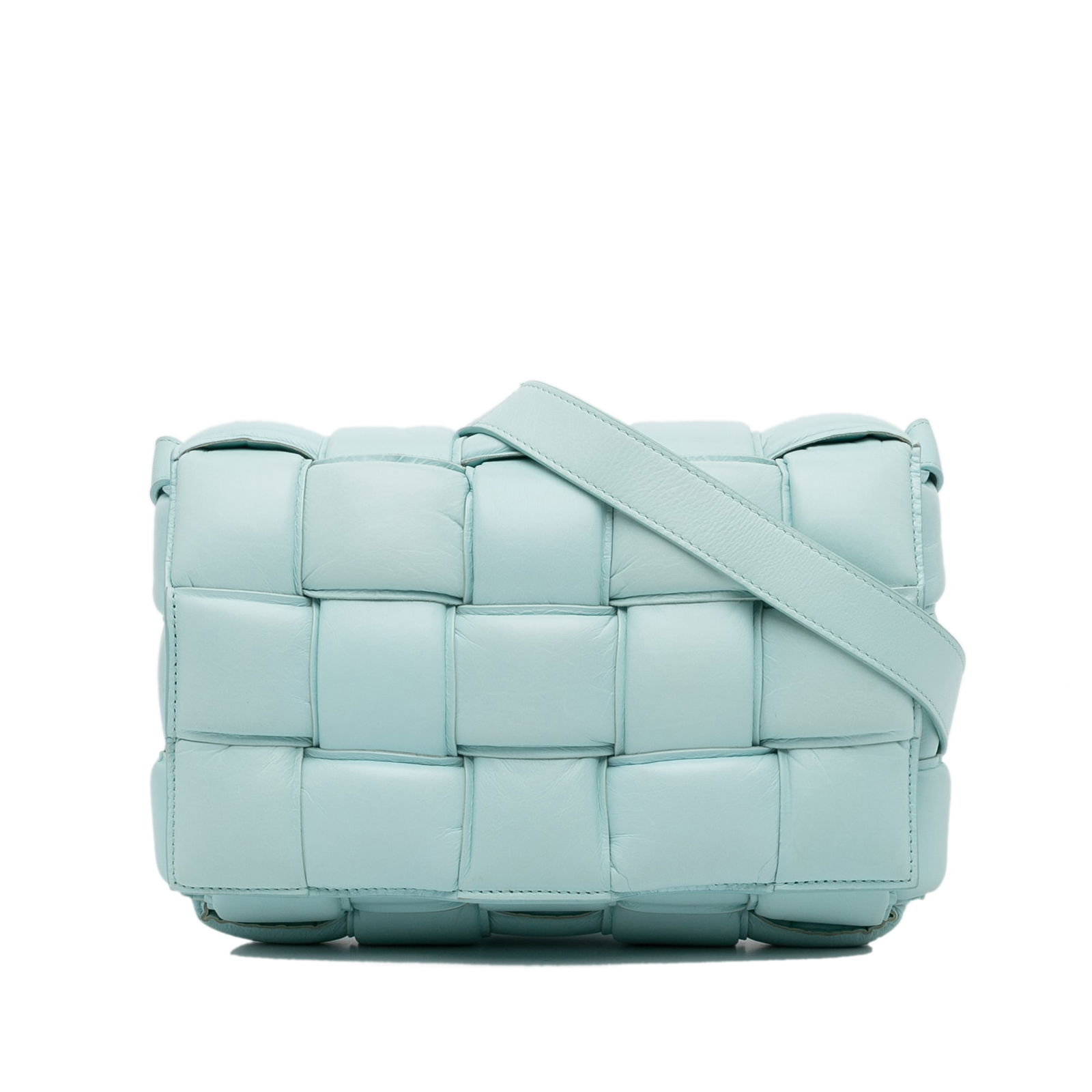 Bottega Veneta Blue Nappa Intrecciato Padded Cassette Crossbody Bag: Bottega Veneta Blue Nappa Intrecciato Padded Cassette Crossbody Bag Introducing the Bottega Veneta Nappa Intrecciato Padded Cassette Crossbody, a stunning blend of luxury and functionality. This exqui