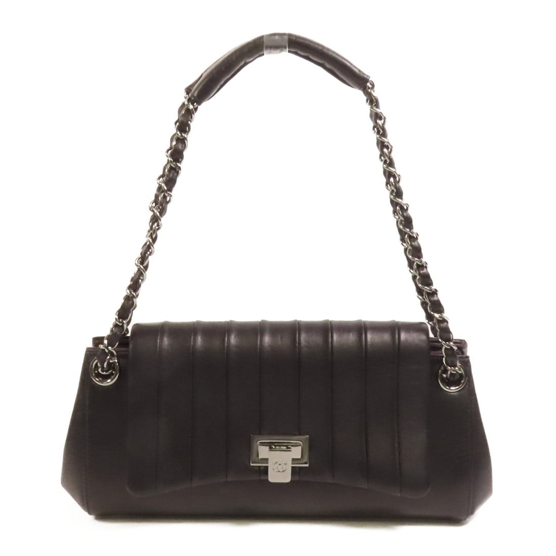 Black Lambskin Leather Shoulder Bag by CHANEL with Silver CC Hardware: Black Lambskin Leather Shoulder Bag by CHANEL with Silver CC Hardware This CHANEL shoulder bag is crafted from luxurious black lambskin leather and features the iconic CC logo with silver-tone hardwar