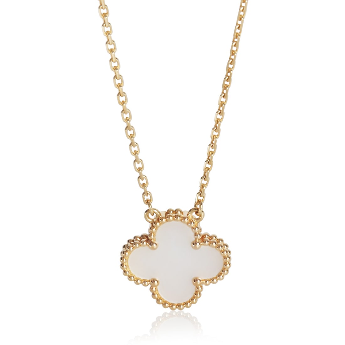 Van Cleef Arpels Vintage Alhambra Pendant in 18k Yellow Gold with Mother of Pearl: Van Cleef Arpels Vintage Alhambra Pendant in 18k Yellow Gold with Mother of Pearl This Van Cleef & Arpels Vintage Alhambra pendant features a mother of pearl centerpiece set in 18k yellow gold. The pe