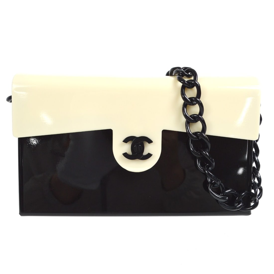 Chanel Bi-Color Ivory Black Plastic Shoulder Bag: Chanel Bi-Color Ivory Black Plastic Shoulder Bag This stylish Chanel shoulder bag features a bi-color design in ivory and black, crafted from durable plastic. The medium-sized bag is perfect for every