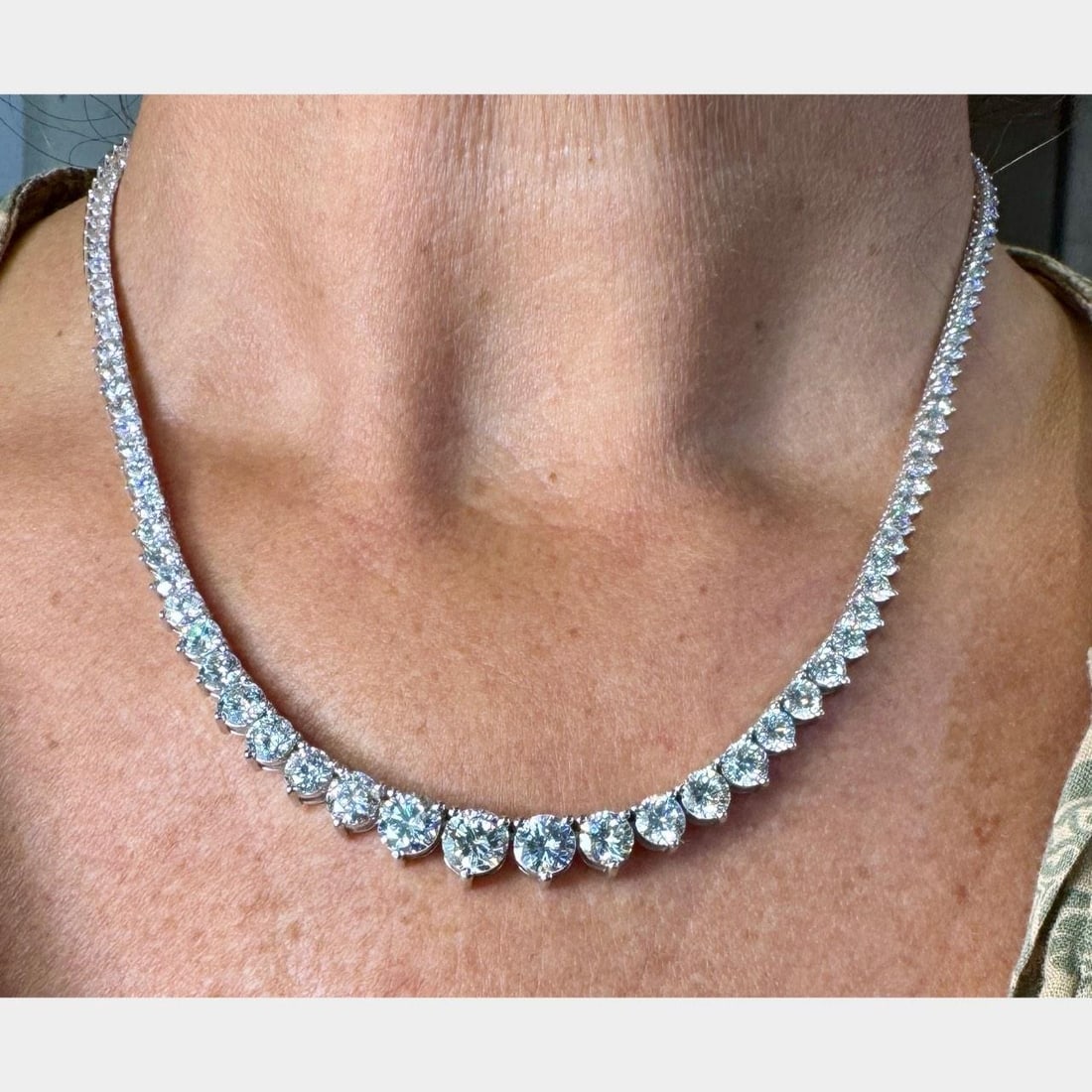 GIA Certified 14K White Gold 23.10 Carat Diamond Tennis Necklace: GIA Certified 14K White Gold 23.10 Carat Diamond Tennis Necklace This 14K white gold graduated diamond tennis necklace features a total diamond weight of approximately 23.10 carats, including 126 diam